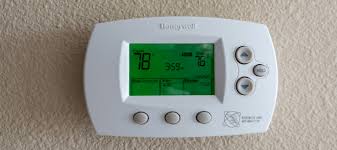 why is my thermostat flashing cool on