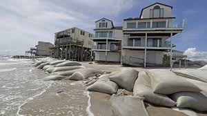 rising seas menace barrier island homes