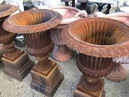 Pair Of Rusty Cast Iron Urns 105 Cm