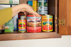 How do you store canned goods in the pantry?