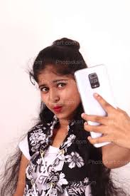 Smart Indian girl taking selfie stock image | Photoskart