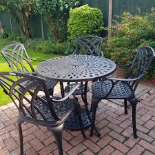 mia 4 seater round garden table set