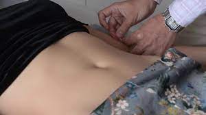Inserting needle via tube in japanese acupuncture - YouTube