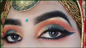 green bold bridal eye makeup muslim