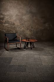 raw elements carpet tiles designed by