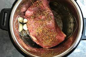 · add quartered onion, crushed garlic cloves, pickling spices and the liquid. Instant Pot Corned Beef And Cabbage Family Fresh Meals