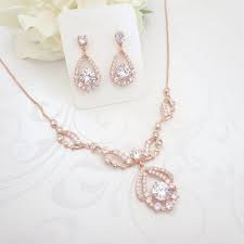 Image result for simple earrings neckpieces and wristwatches