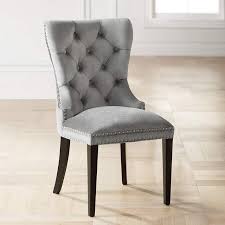 Complemented with button tufted diamond stitching and a beautiful nailhead trim, this chair brings a chic touch to any decor. Euphoria Tufted Gray Velvet Dining Chair 33w41 Lamps Plus