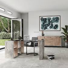 Assemble the desk with bolts to hold the pieces together. Nova Domus Boston Modern Glass Faux Concrete Desk