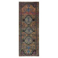 hand knotted worn wool rug