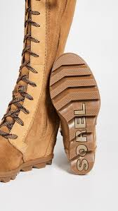Theses boots have that typical sorel look however for me the velvet like lining is problematic. Sorel Leather Joan Of Arctic Wedge Ii Tall Boot In Camel Brown Brown Lyst