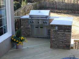 The outdoor kitchen can be as basic as you want but make sure the dining set up is as comfortable as possible and encourages interaction. Small L Shape Outdoor Kitchen Small Outdoor Kitchens Outdoor Kitchen Plans Patio Grill