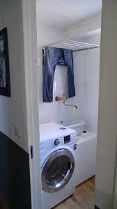 Ilustrasi ruang jemur lengkap dnegan mesin cuci dan penampung air. 10 Tips Membuat Ruang Cuci Pakaian Di Dalam Rumah Homify