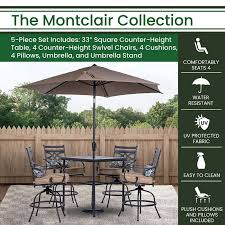 Hanover Montclair 5 Piece High Dining Set In Navy Blue With 4 Swivel Chairs 33 In Counter Height Dining Table And 9 Ft Umbrella