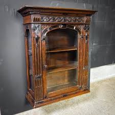 antique oak hang cabinet with glass