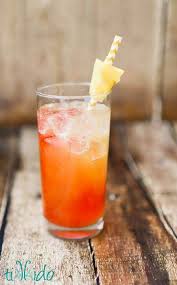 A blend of malibu, pineapple and cherry. Pineapple Coconut Malibu Rum Summer Cocktail Recipe Tikkido Com