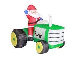 santa riding tractor inflatable