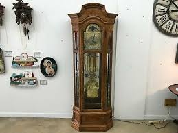 howard miller curio grandfather clock