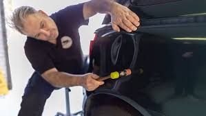 To use it, stick the suction cup over the dented area and and open the air valve on the handle to seal it tight. Paintless Dent Removal The Truth About Paintless Dent Repair