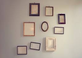 Blank Empty Photo Frames Hanging On The