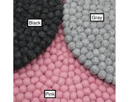 black pink grey felt ball rug for