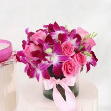 order purple orchids pink roses in