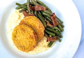 pan fried tomatoes with corn grits and