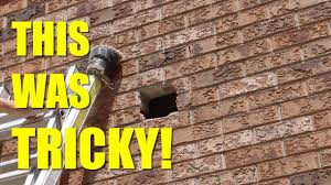 fixing a hole in a brick wall you