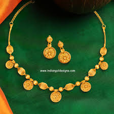 tanishq antique gold necklace set