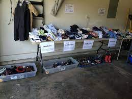 At our yard sales, we generally hang a dowel rod between one of the garage door openings to hang clothes on, but for the secondhand market, i knew we would need clothes hanging storage that would stand alone. Top 10 Tips For Hosting A Garage Sale Sometimes Homemade