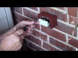 Install Exterior Plug On A Brick Porch