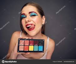 makeup artist with crazy emotion stock