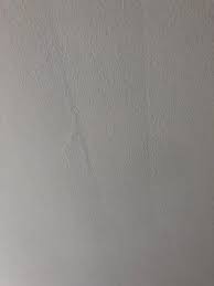 drywall seam visible in ceiling