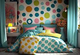 A Bedroom With Polka Dots On The Wall