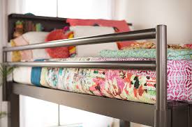 changing sheets on a loft or bunk bed