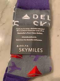 delta gifting plane widget socks to