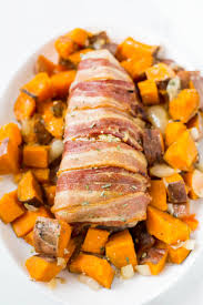 Remove the tenderloin from the marinade and place it in an oven proof baking dish and bake it for 40 minutes. Slow Cooker Bacon Wrapped Pork Loin Roast Paleo Whole30 The Healthy Consultant