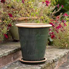 View our extensive range of ceramic indoor plant pots, vases and bowls. Buy Large Glazed Ceramic Pot Saucer Ocean Green Delivery By Crocus