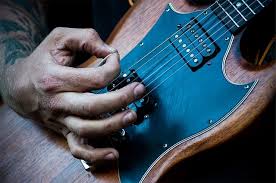 Tomas michaud is an american born guitarist and music educator with a french canadian heritage. How To Hold A Guitar Pick Beginner Guitar Hq