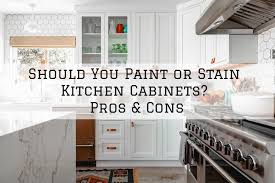 With the right stain, a sander and a rag, your kitchen cabinets can be transformed in days. Brush Roll Painting Should You Paint Or Stain Kitchen Cabinets Pros Cons Brush Roll Painting
