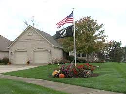 Front range muffler of colorado springs! Veteran Homeowners Group At Odds Over Flagpole Country Landscaping Ideas Front Yard Design Front Yard Landscaping Design