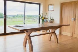 A modern dining table built for the ages. Large Cross Leg Extending 10 Seater Oak Dining Table Free Delivery Top Furniture