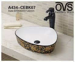A bright red bathroom clad with bold mosaic tiles, a dark sink and pendant lamps. China Special Shape Red Wash Basin Cabinet Basin Ceramic Bathroom Vanity China Wash Basin Bathroom Vanity