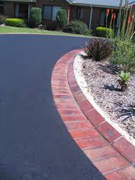 The most common edging materials are plastic landscape edging and stone or concrete blocks. Feature Edging Decorative Driveway Designs Xlasphalt Melbourne Xlasphalt Asphalt Driveways Melbourne