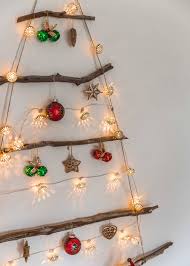 An oversized star tree topper is the perfect finishing touch. Diy Sustainable Stick Christmas Tree The Green Hub