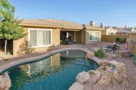 power ranch homes with a pool