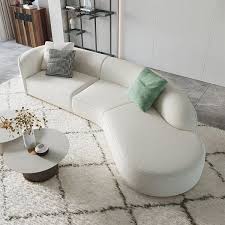 white sectional sofa upholstered