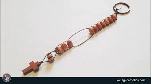 a rosary slide bracelet or key chain