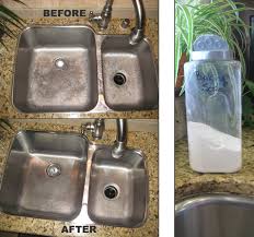 cleaning a stainless steel sink going