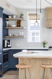 The kitchen backsplash is placed on the kitchen wall between the countertops and the wall the first project on our list features a wonderful rustic backsplash made from the reclaimed wood of old. 42 Colorfull Herringbone Backsplash Ideas Trendy